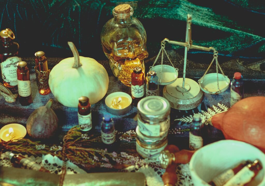 Halloween Themes 2026: Best Spooky Ideas Halloween Themes: witch apothecary table with bottles, jars, herbs, and a skull decanter