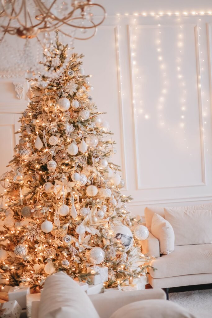 monochromatic white Christmas tree with ivory, pearl, and textured ornaments